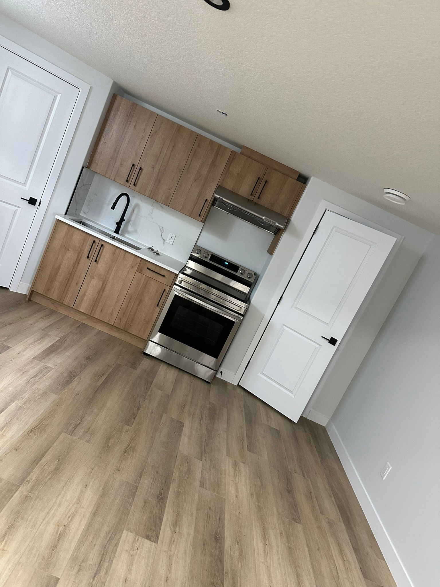 Modern kitchen renovation by 1Fam Construction